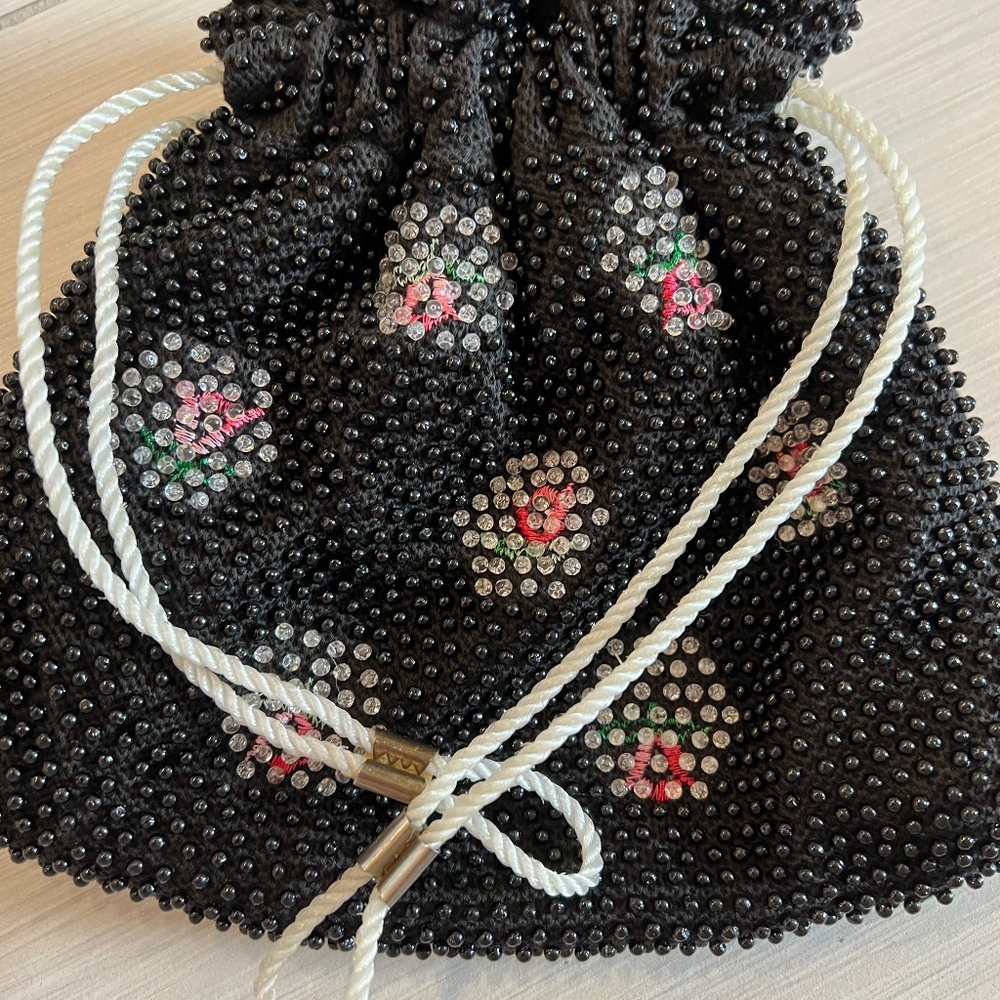 Black beaded reversible to white drawstring bag